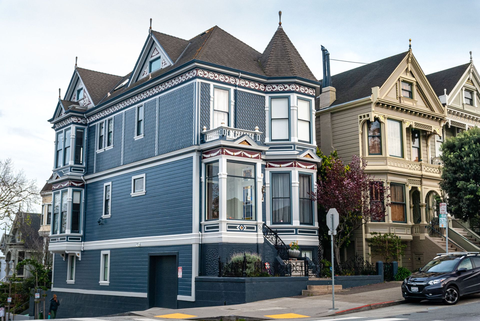 Beautiful Victorian houses on a sunny street in San Francisco, California.